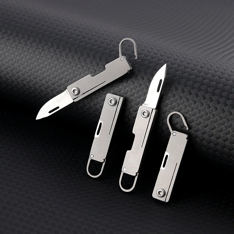 Titanium alloy pocket knife with sharp folding edge, portable keychain pendant, unboxing and unpacking, express knife