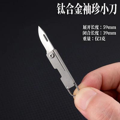 Titanium alloy pocket knife with sharp folding edge, portable keychain pendant, unboxing and unpacking, express knife