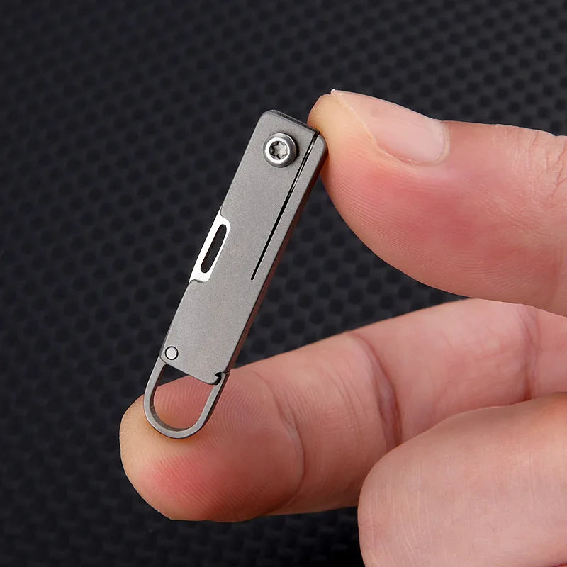 Titanium alloy pocket knife with sharp folding edge, portable keychain pendant, unboxing and unpacking, express knife