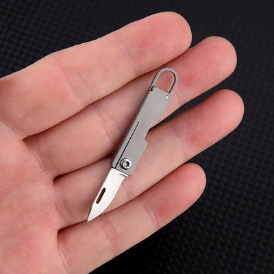 Titanium alloy pocket knife with sharp folding edge, portable keychain pendant, unboxing and unpacking, express knife