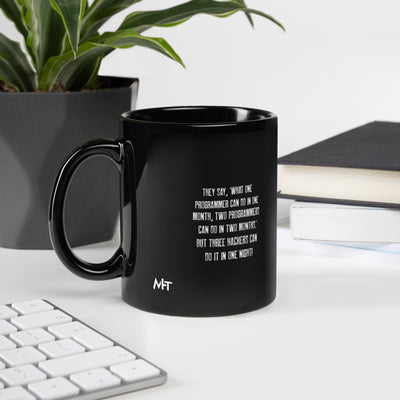 They say, what one programmer can do in one month V1 - Black Glossy Mug
