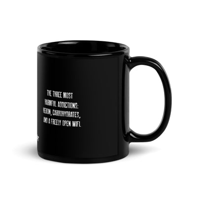 The three most harmful addictions heroin, carbohydrates and a freely open WiFi - Black Glossy Mug